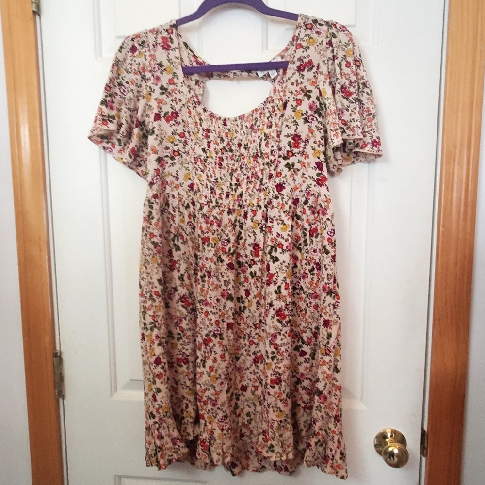 Patrons of peace floral dress. Small with flutter sleeves.